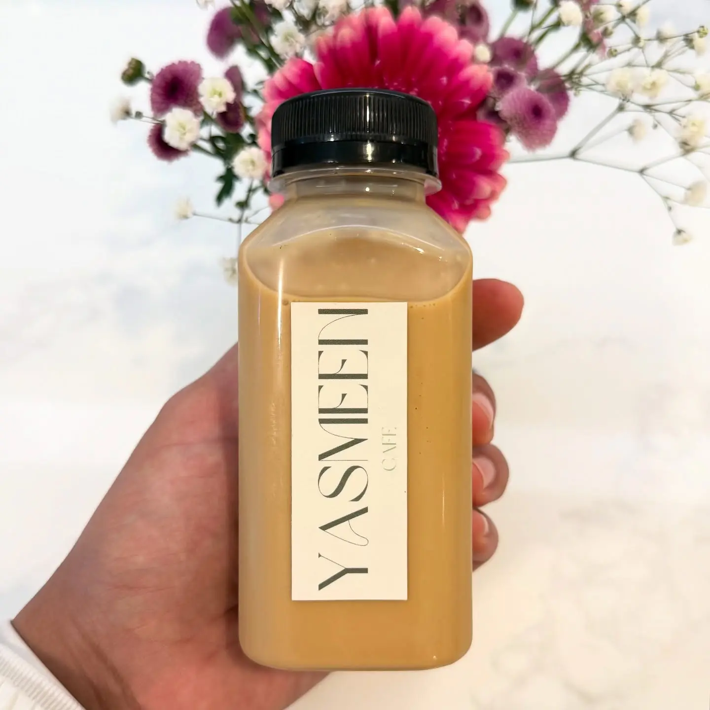 Yasmeen Cafe serving bottled iced latte